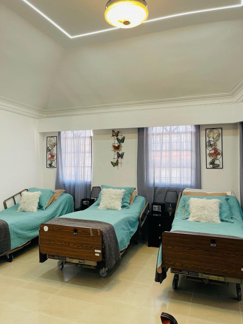 Habitación triple con tres camas